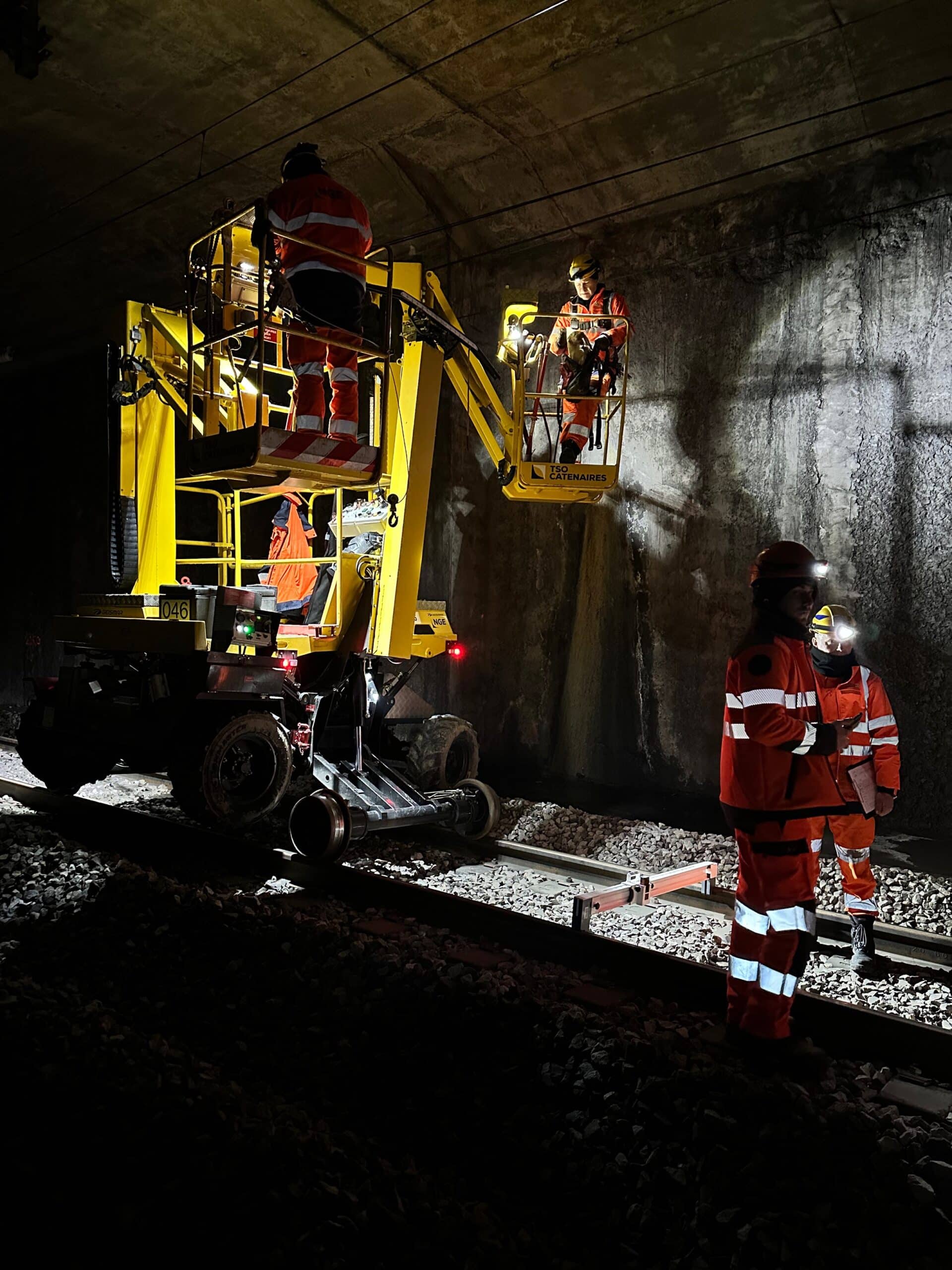 Workers in a rail tunnel